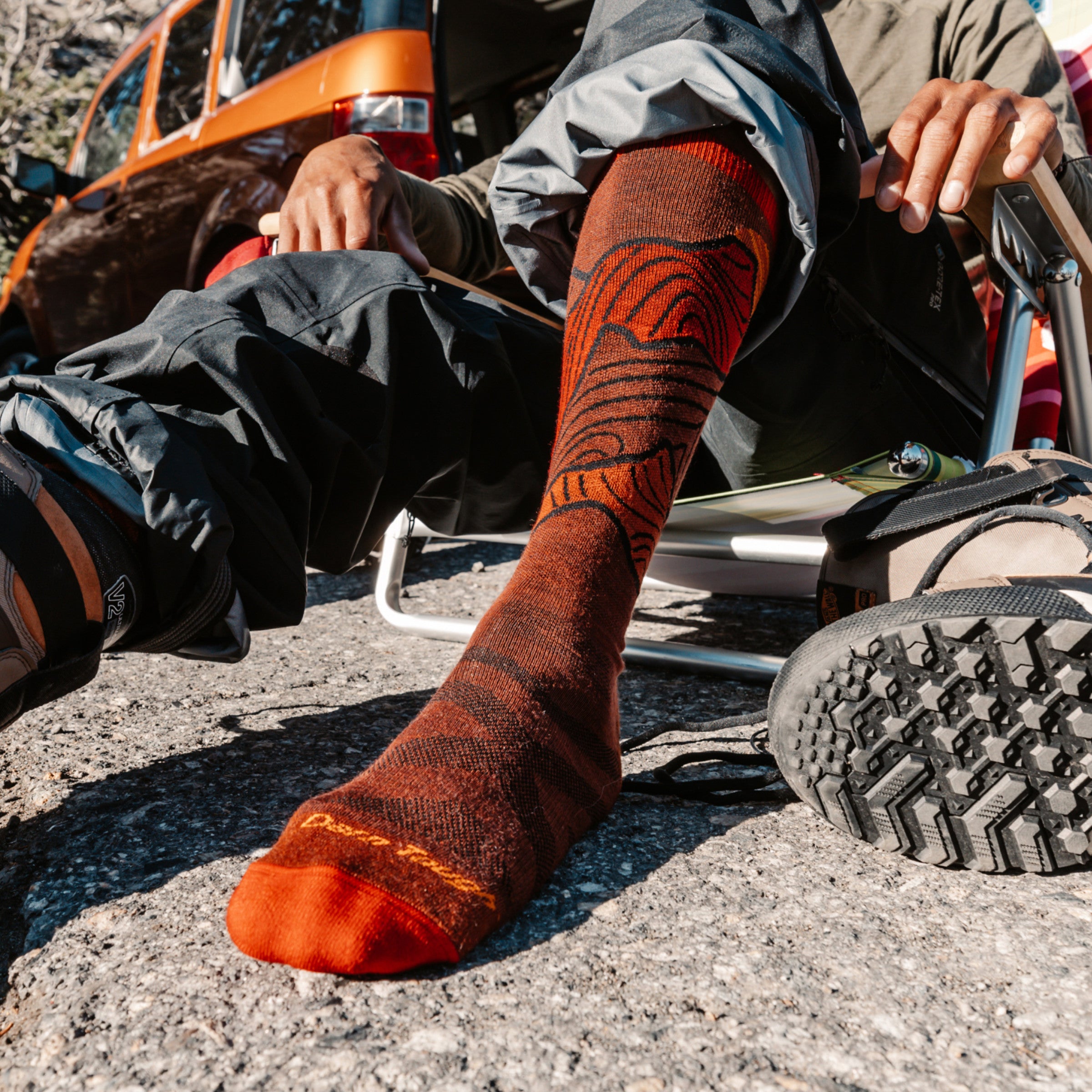close up of model sitting on chair wearing the 8050 fireball