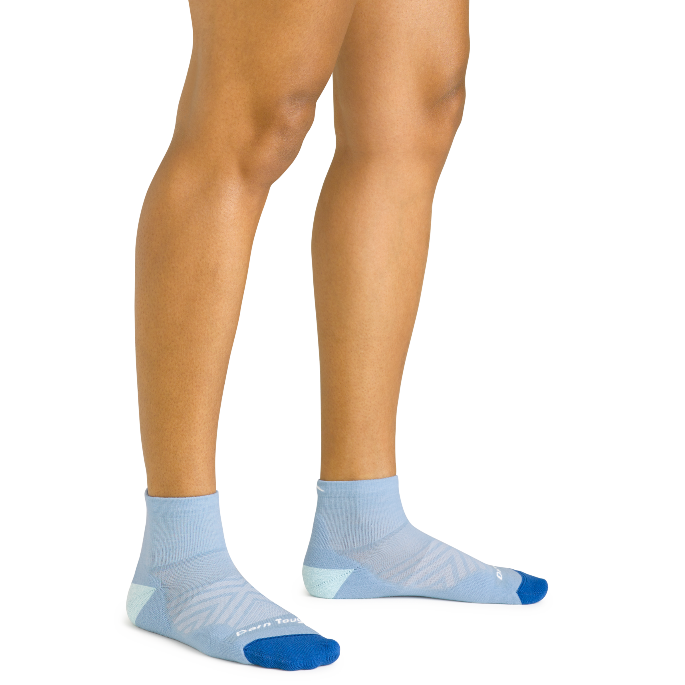 Close up shot of model wearing the women's quarter running sock in sky blue with no shoes on