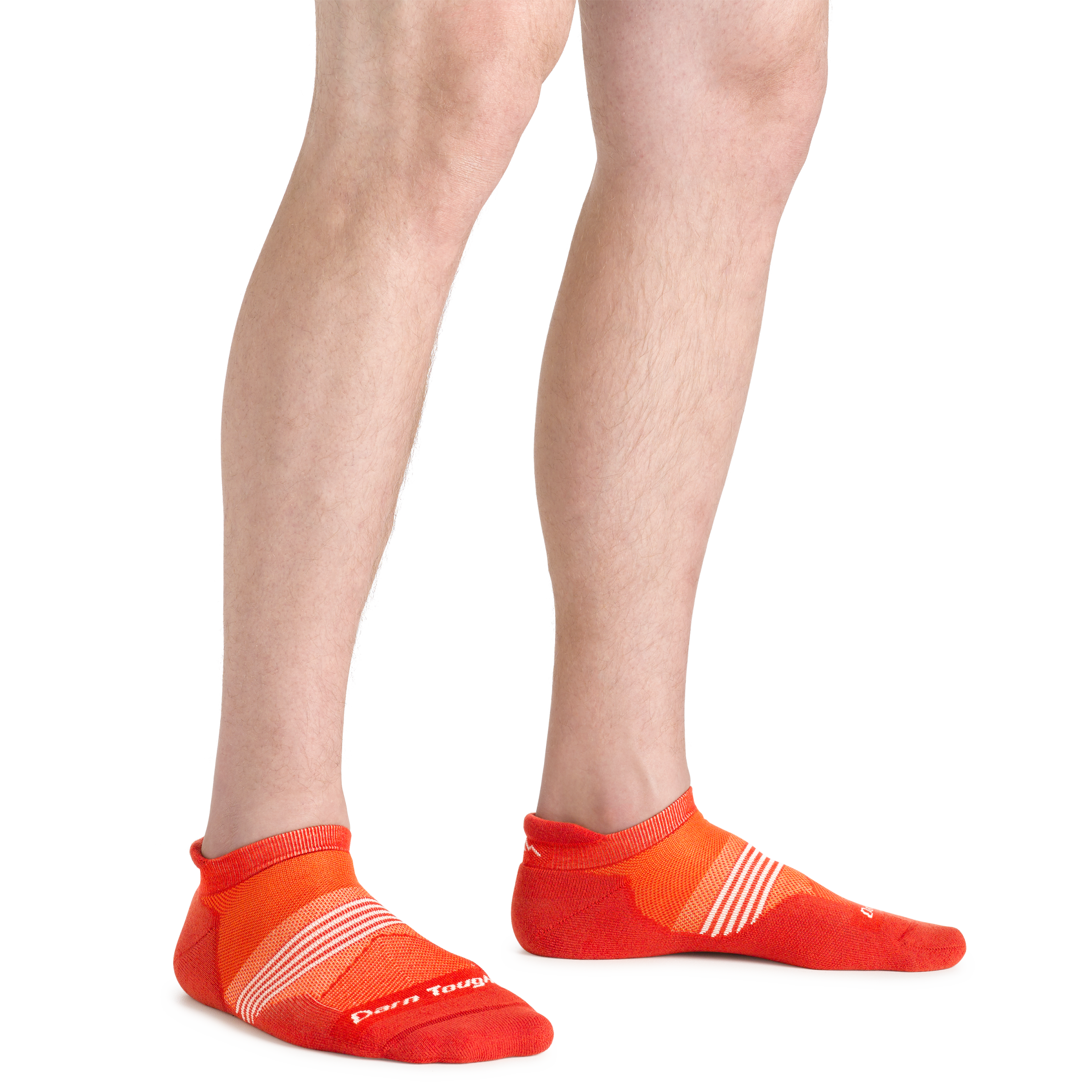 Close up shot of model wearing the men's element no show tab running sock in tiger color with no shoes on