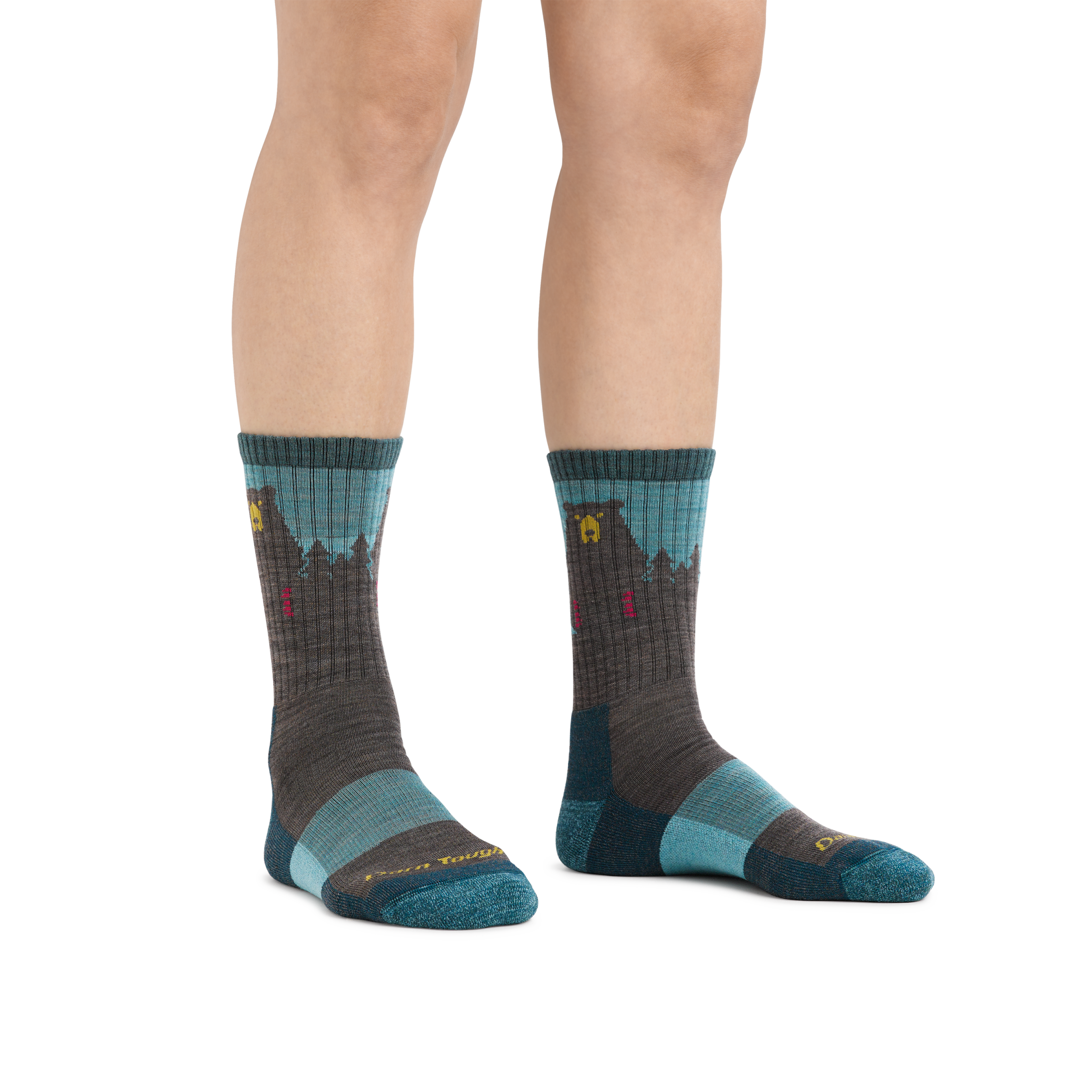 Image of a woman's feet on a white background, wearing Women's Bear Town Micro Crew Lightweight Hiking Socks in Aqua