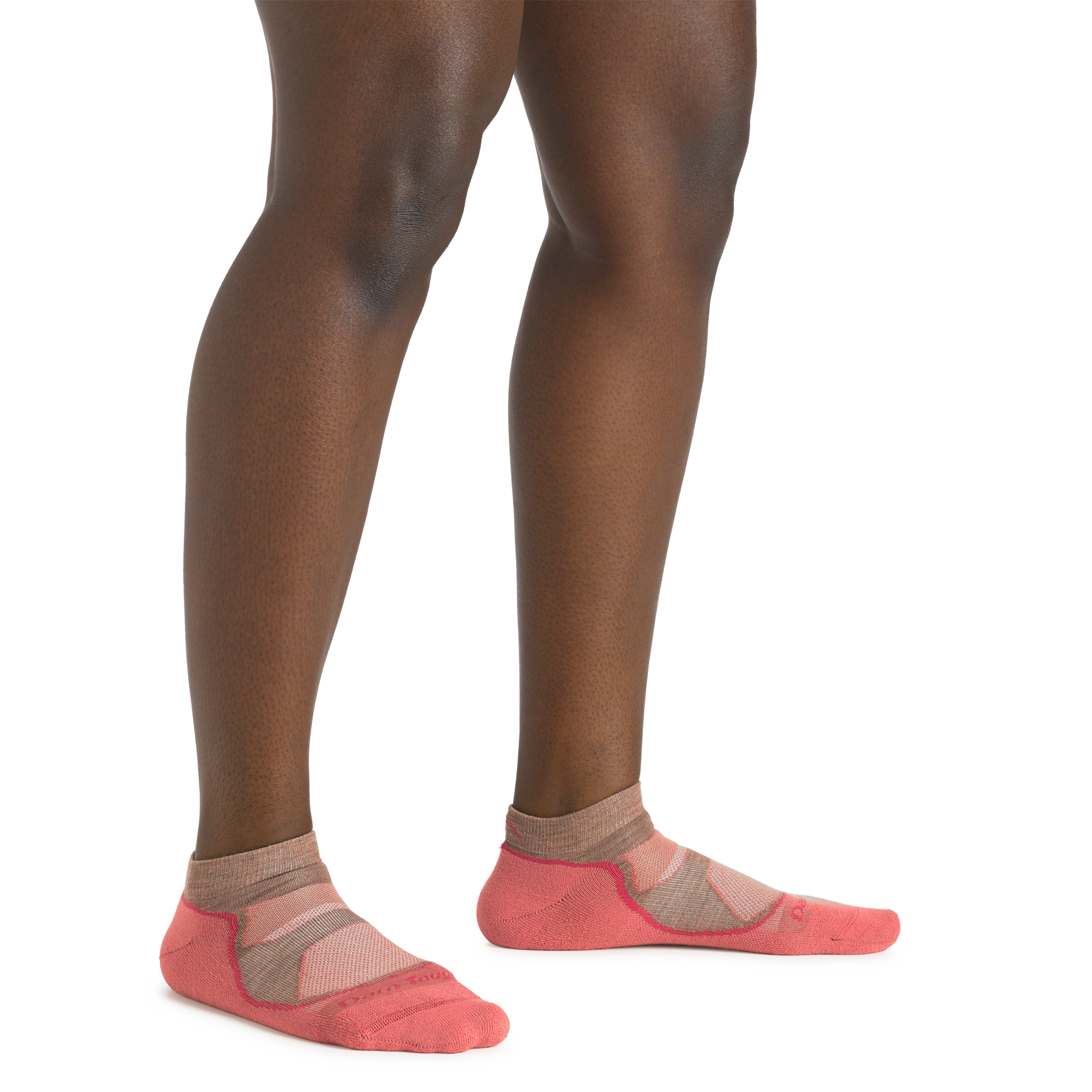 Close up shot of model wearing the women's light hiker no show hiking sock in canyon colorway with no shoes on