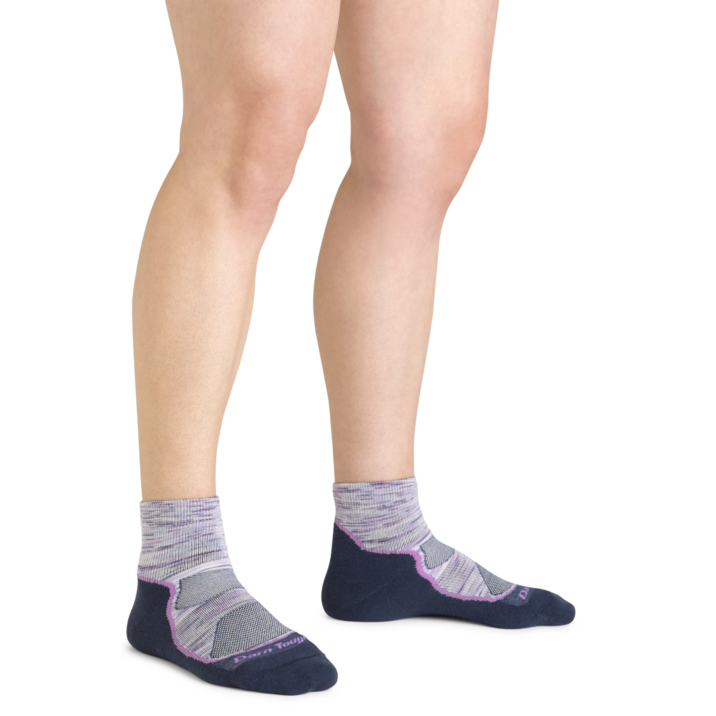 Close up shot of model wearing the women's light hiker quarter hiking sock in cosmic purple with no shoes on