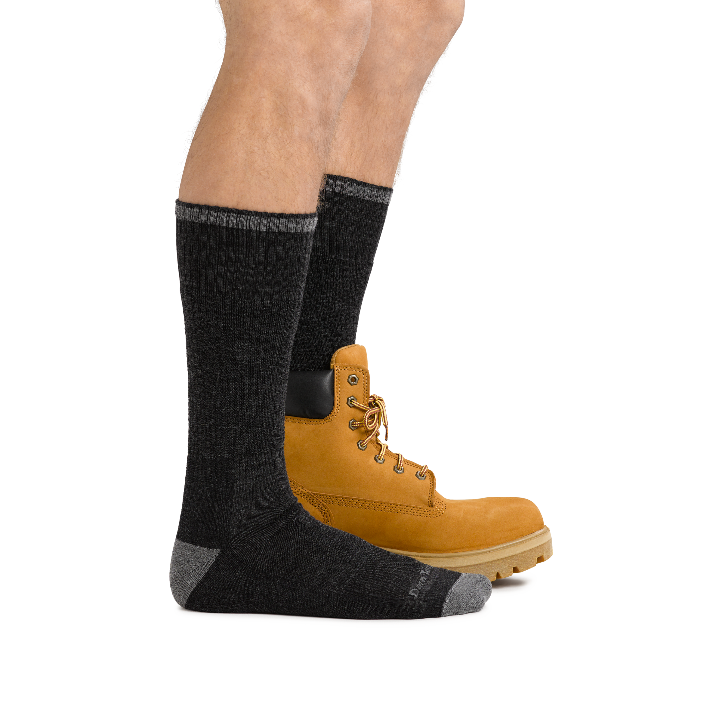Male legs facing to the right wearing John Henry Boot Midweight Work Sock in Gravel and back foot also in a work boot