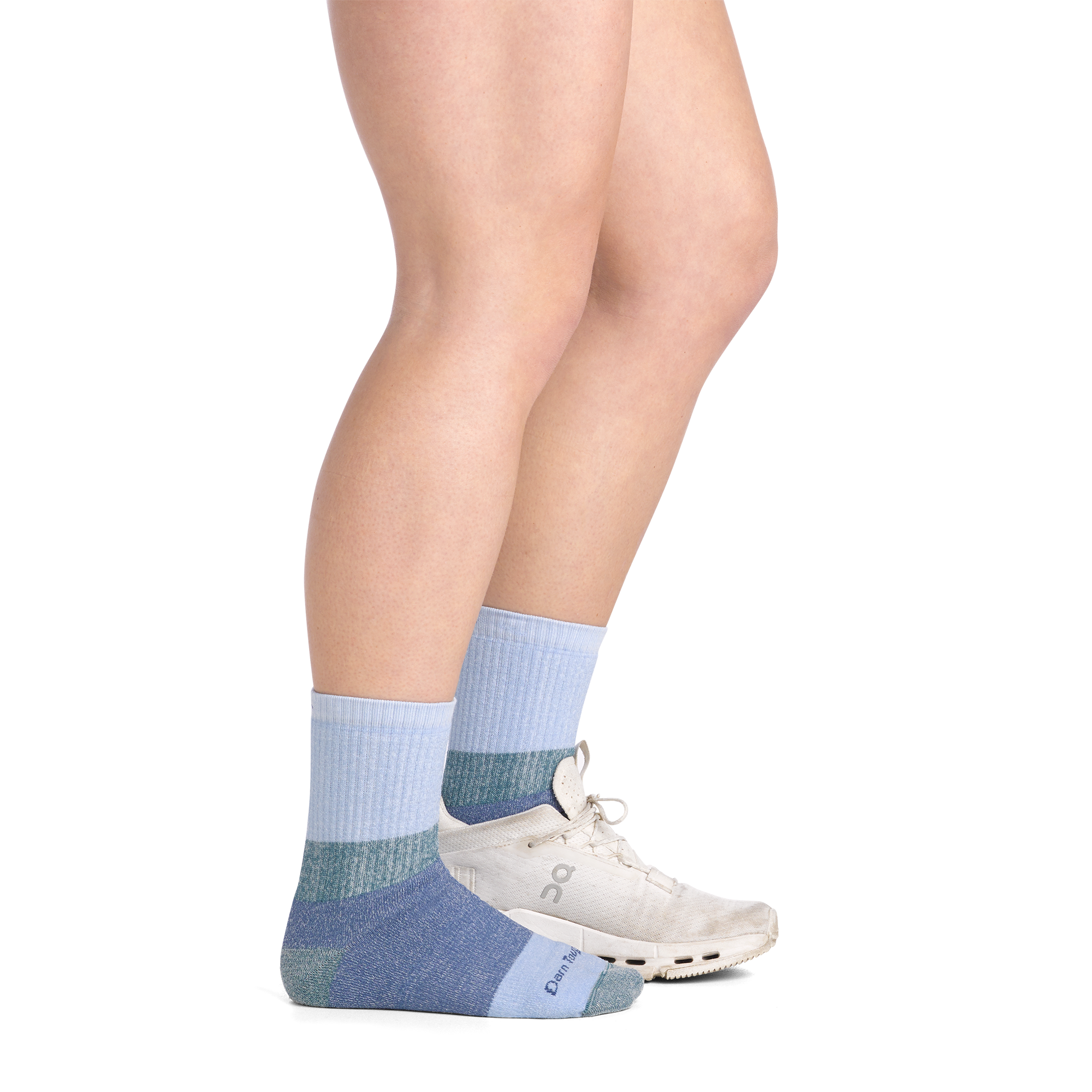 on model image side view shoe on back foot wearing the 3045 hill topper micro crew sock in Dragonfly colorway