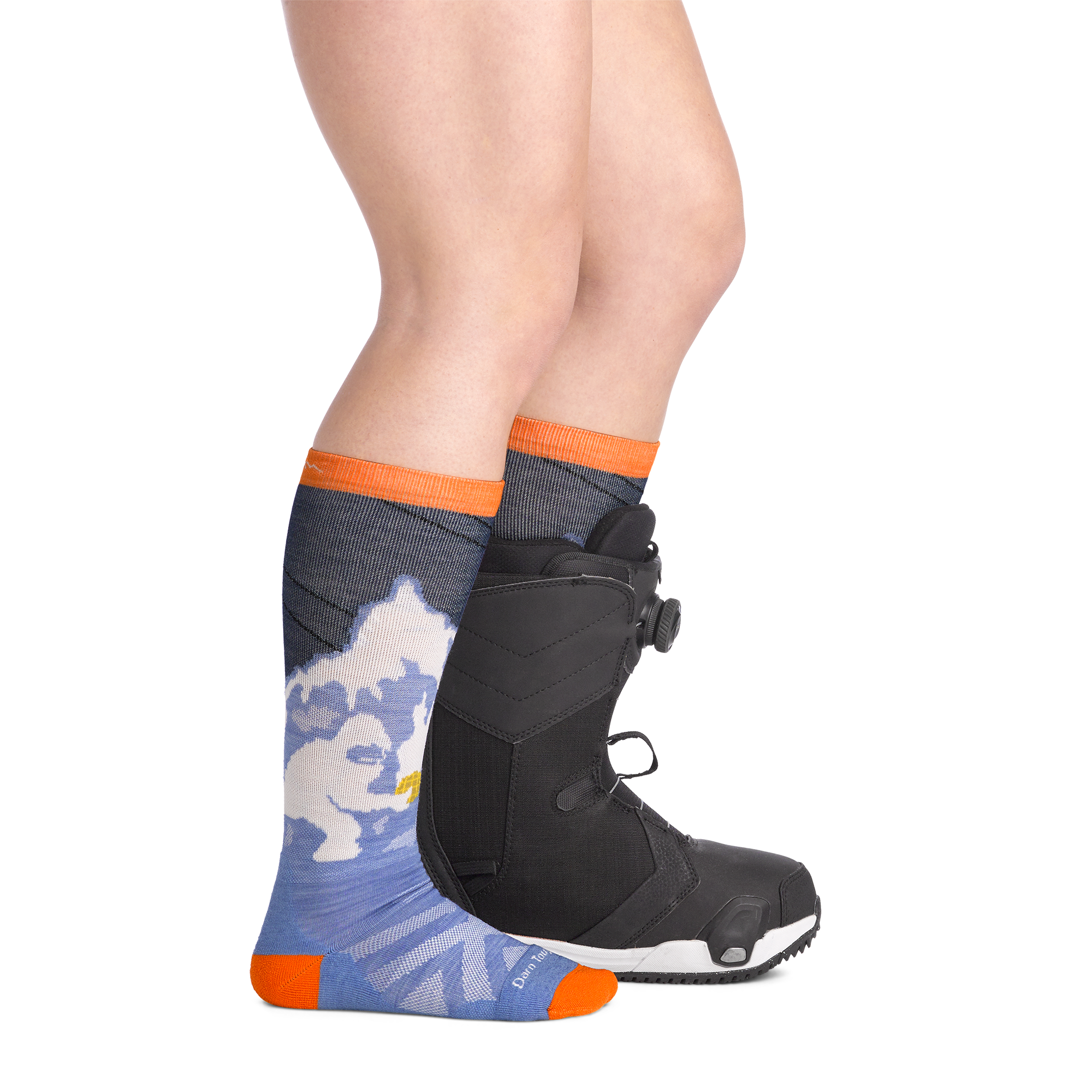 on model image side view back foot in boot wearing the 3809 little yeti over the calf sock in midnight colorway