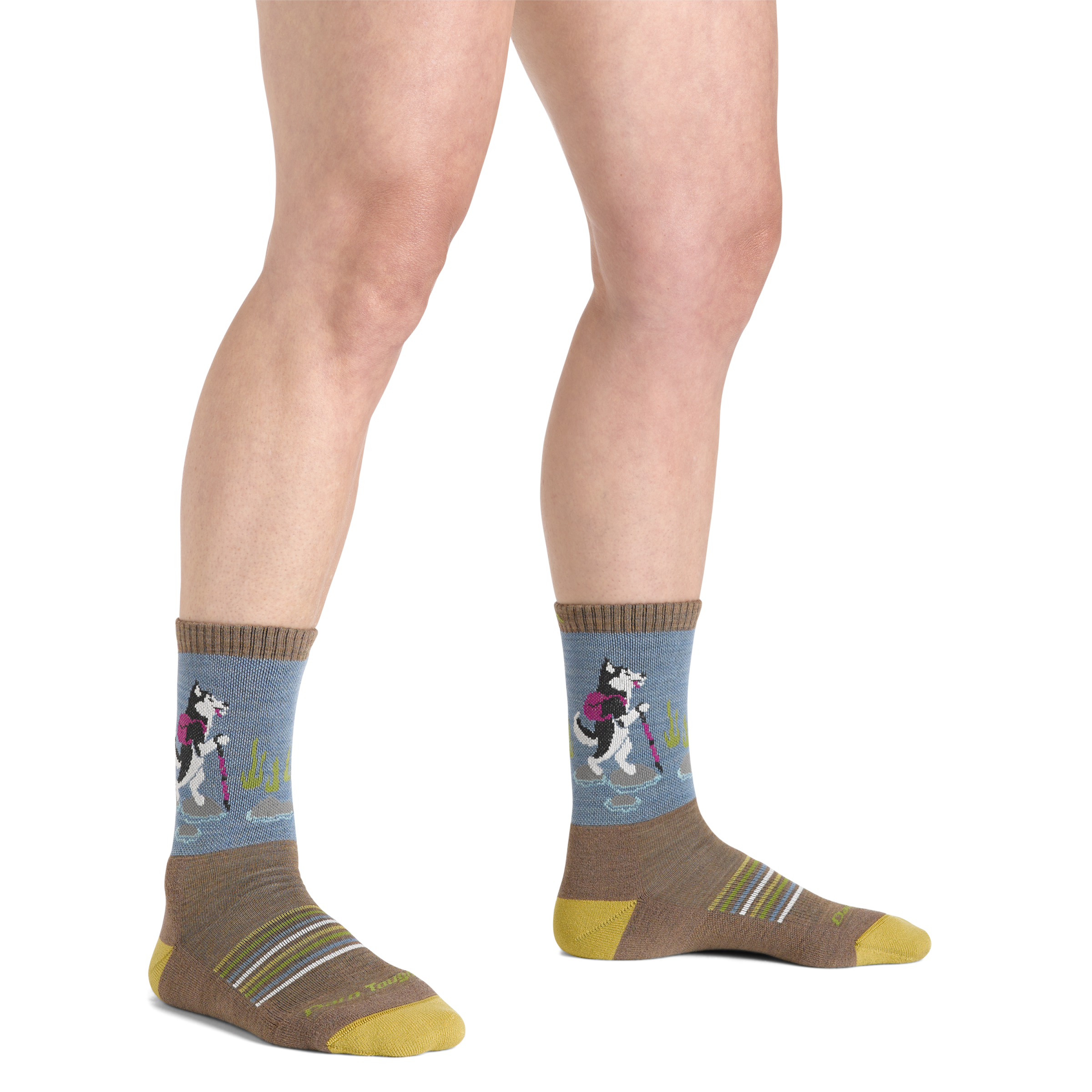 Close up shot of model wearing the women's critter club micro crew hiking sock in bark colorway with no shoes on