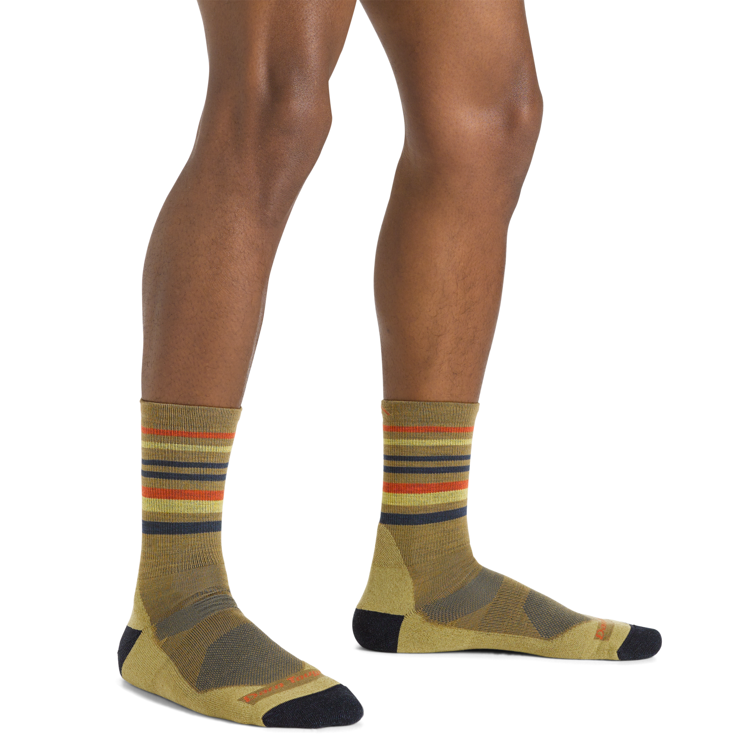 Close up shot of model wearing the men's fastpack micro crew hiking socks in sandstone with no shoes on