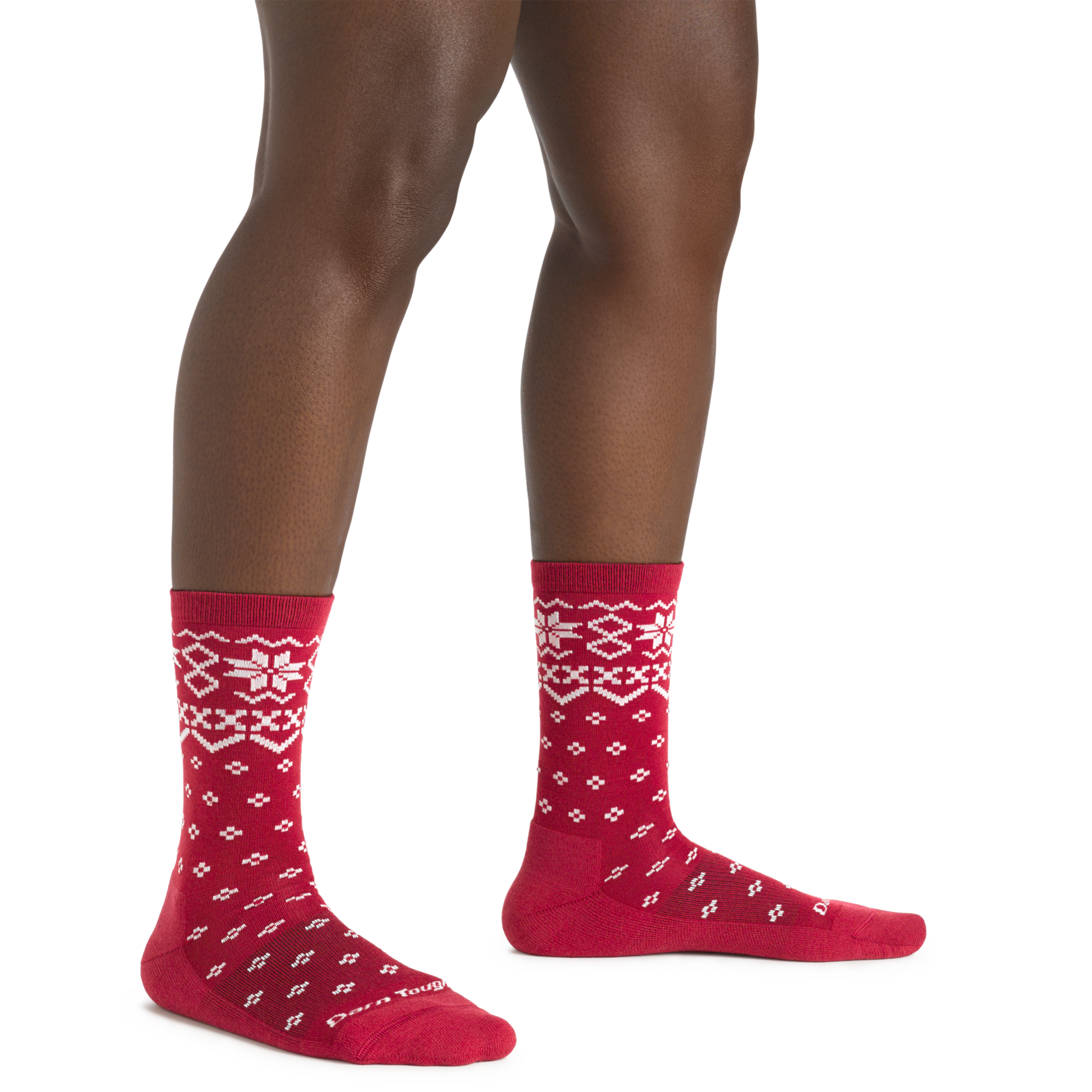 Close up studio shot of model wearing women's shetland crew lightweight lifestyle sock in cranberry