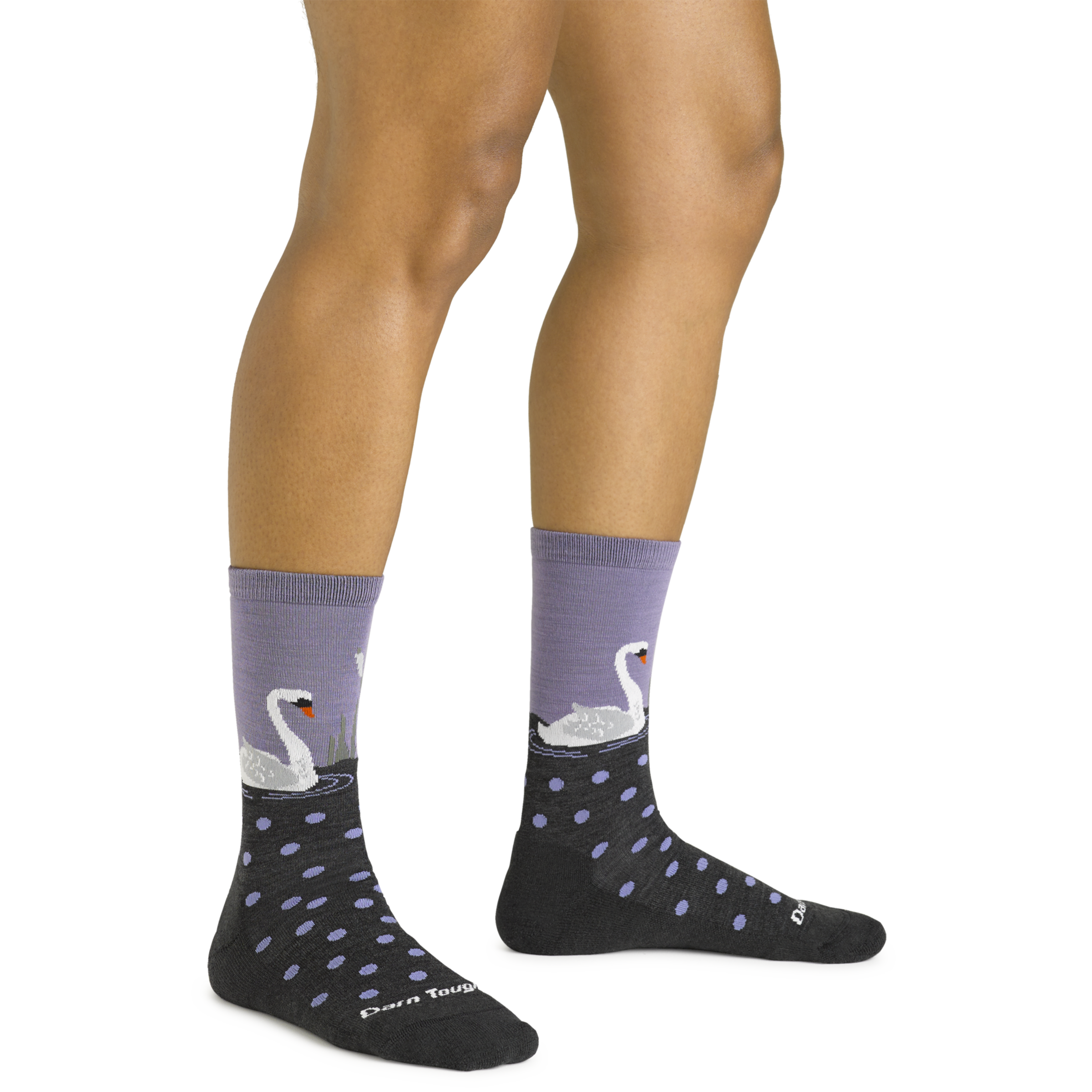 Close up shot of model wearing the women's wild life crew lifestyle socks in charcoal with no shoes on