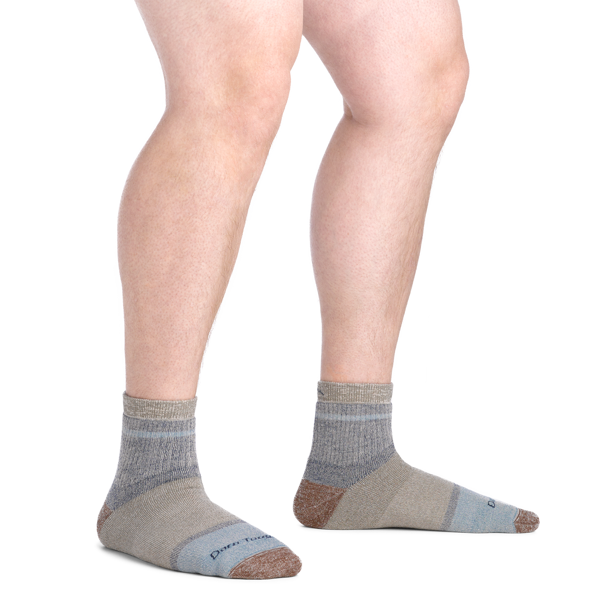 on model image bare foot wearing the 6118 shorty lifestyle sock in canteen colorway