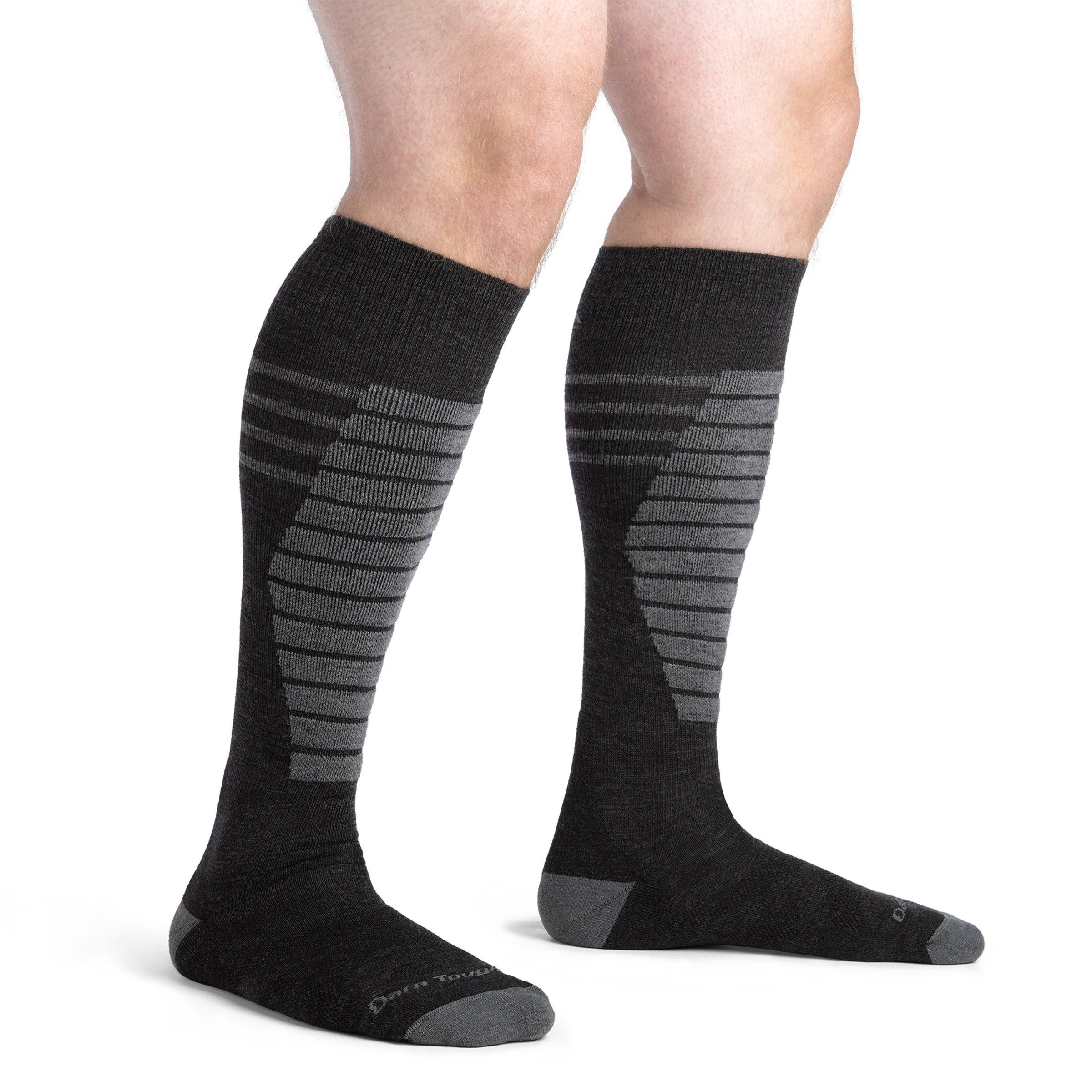 Close up studio shot of model wearing men's edge over-the-calf midweight ski & snowboard sock in Charcoal