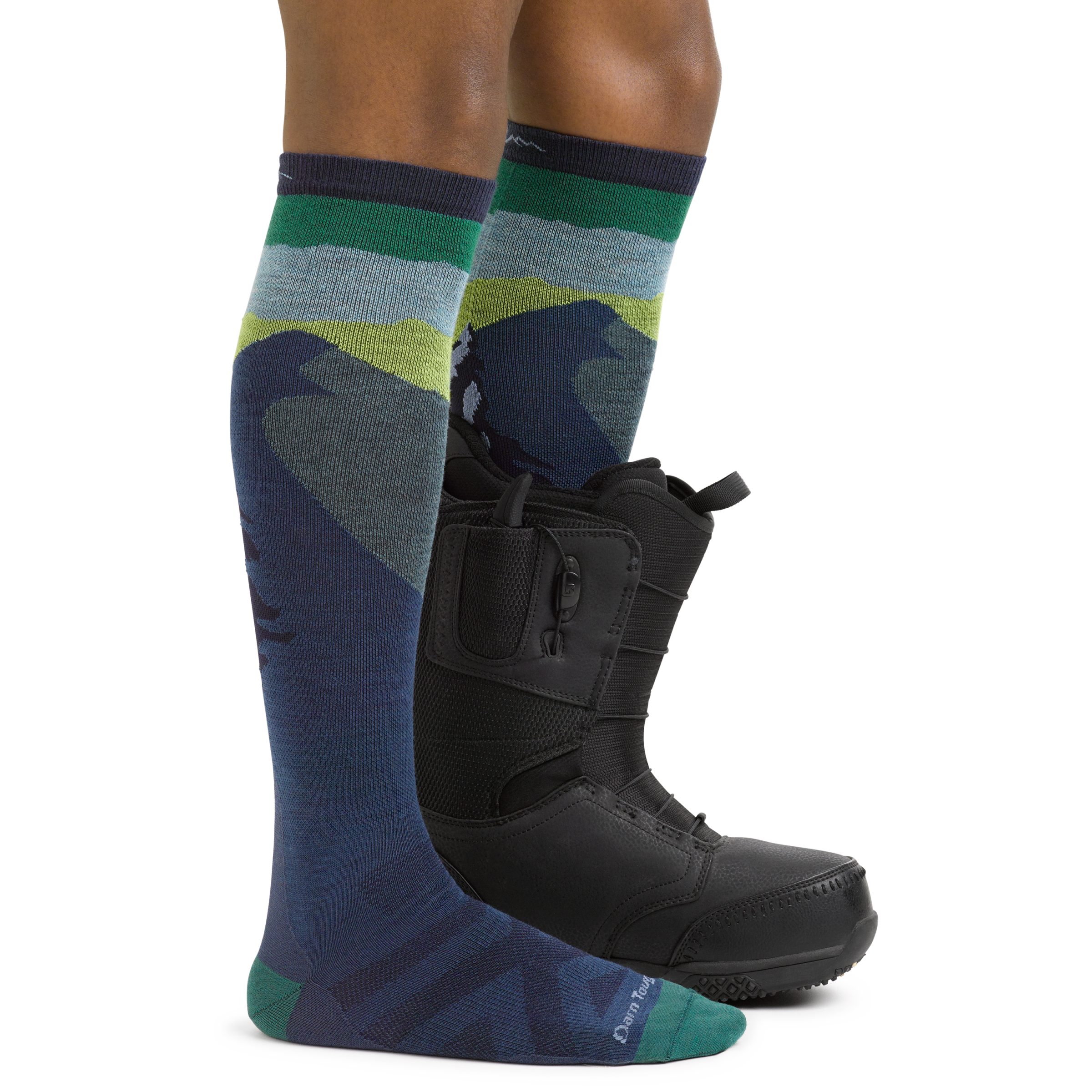 Men's Solstice Snowboard and Ski Socks in Midnight blue on foot with boot