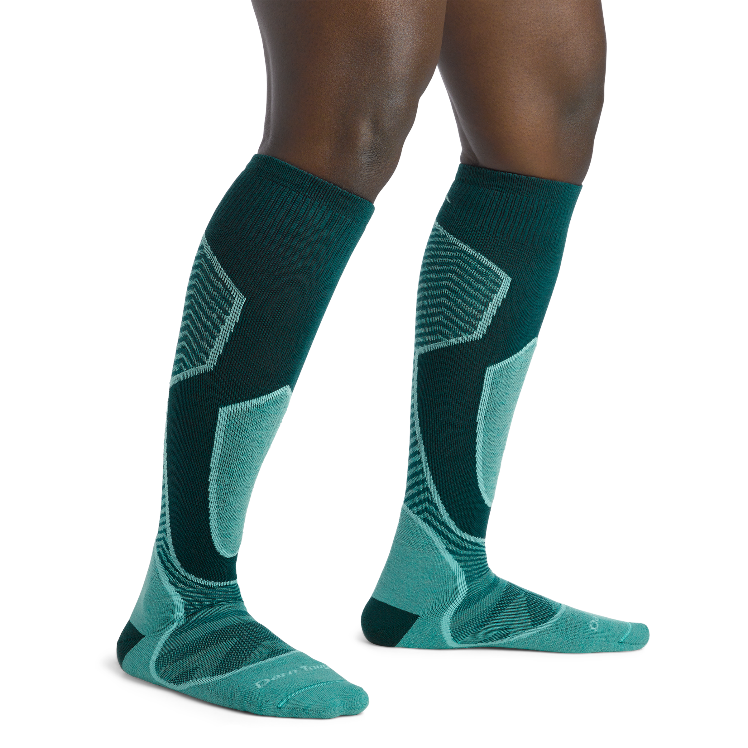 Woman standing barefoot wearing Outer Limits Over the Calf Ski & Snowboard in Juniper