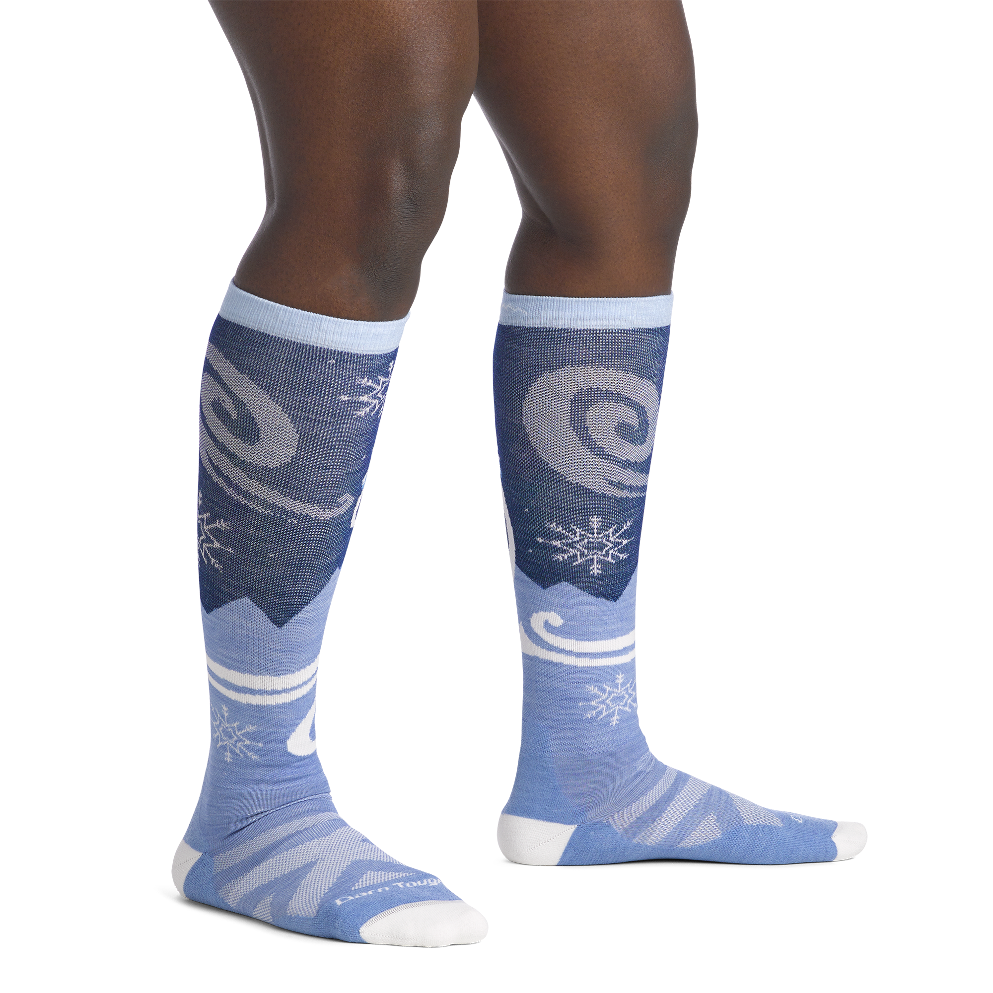 on model image bare foot wearing the 8054 swirlwind over the calf sock in midnight colorway