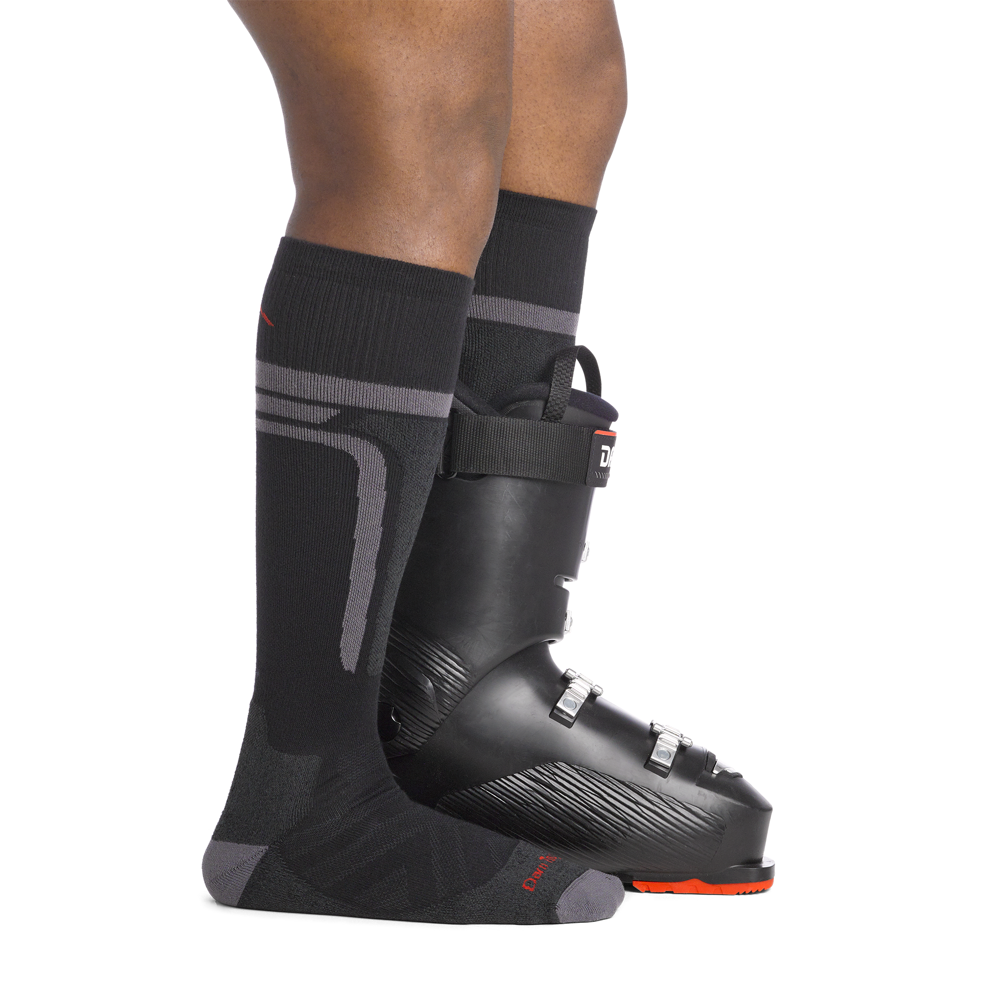 on model image side view back foot in boot wearing the 8058 thermolite edge over the calf sock in black colorway