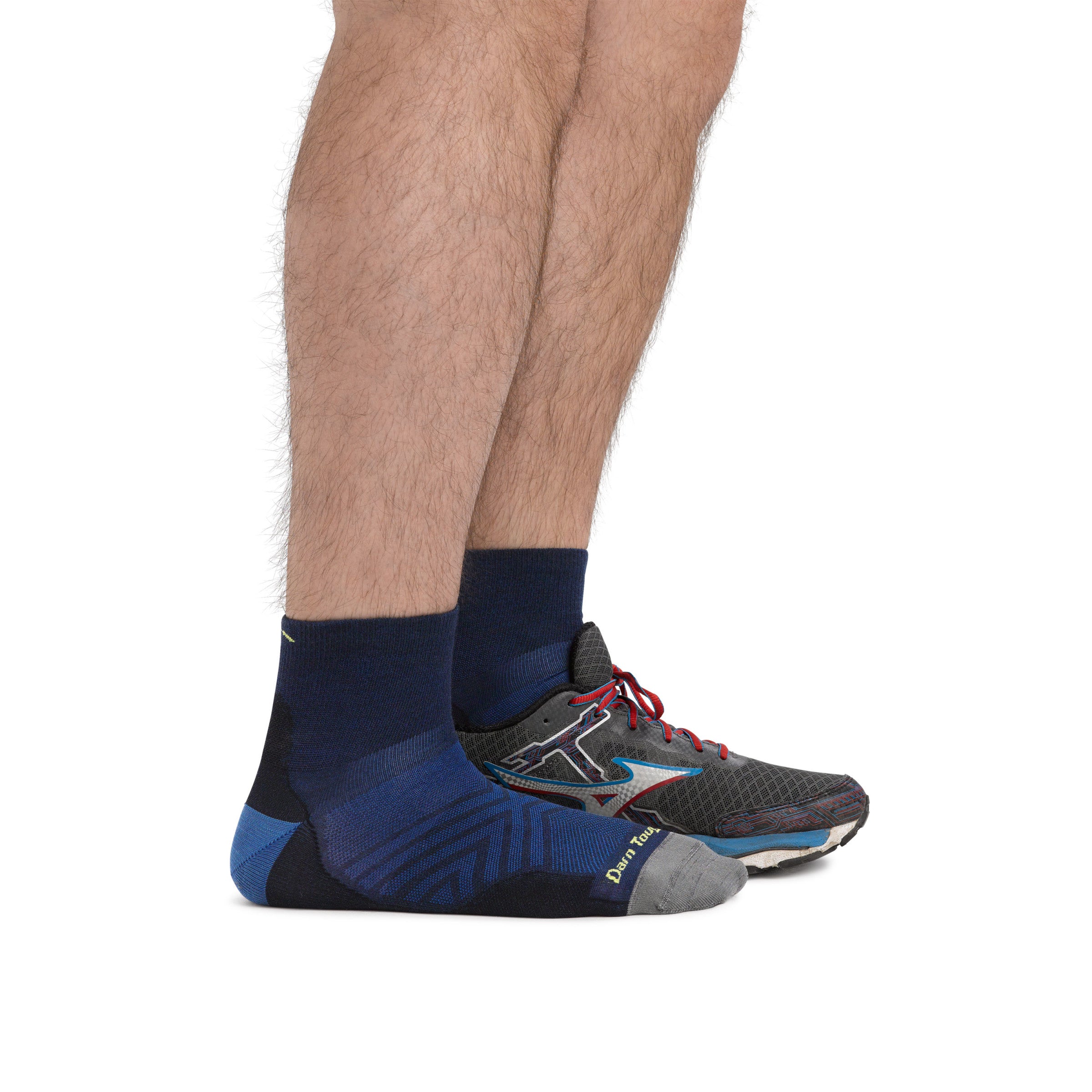 Men's Quarter Running Sock in Eclipse on a male model with back foot wearing a running sneaker, showing height of sock, Lifestyle Image