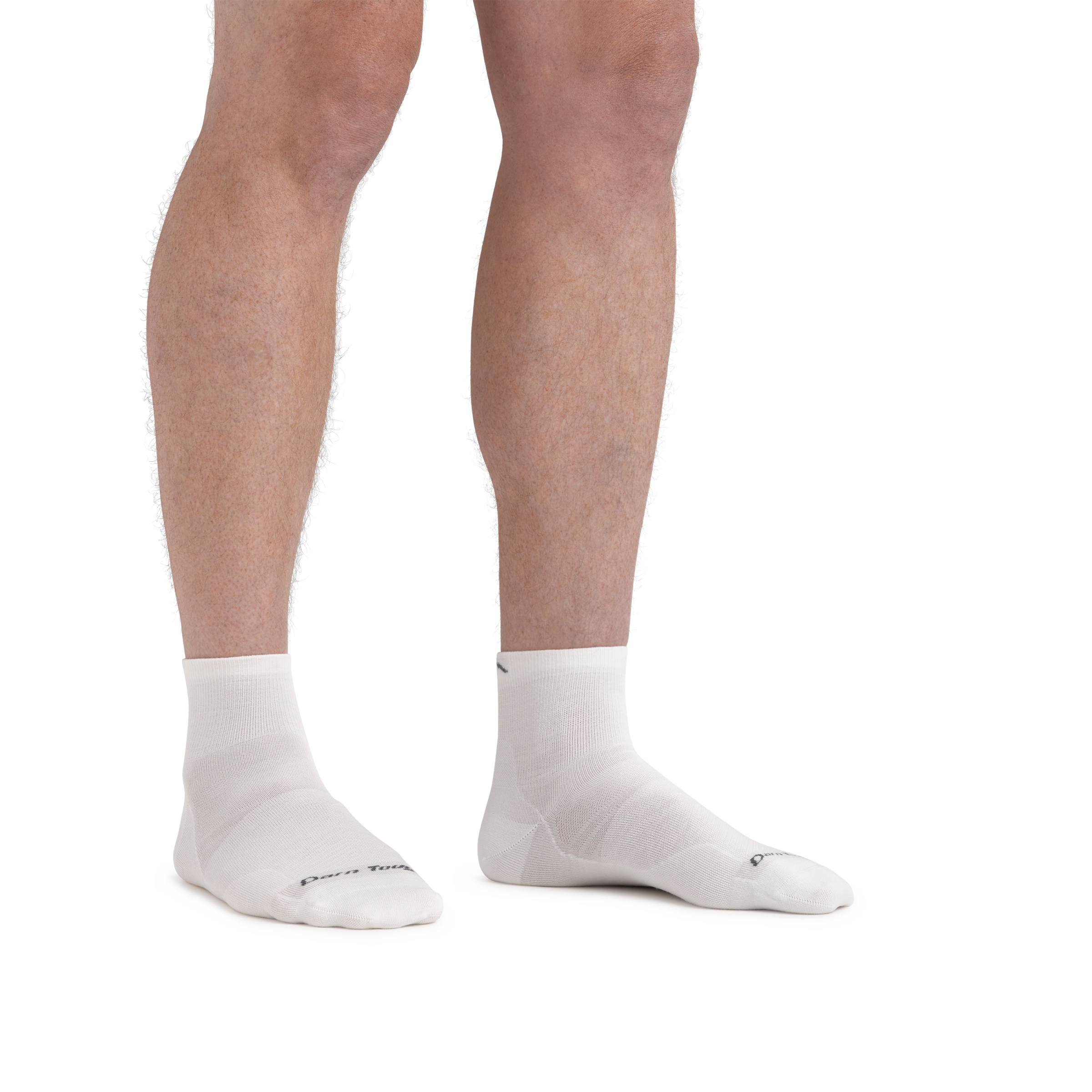 Man standing barefoot wearing Run Quarter Ultra-Lightweight Running Socks in White