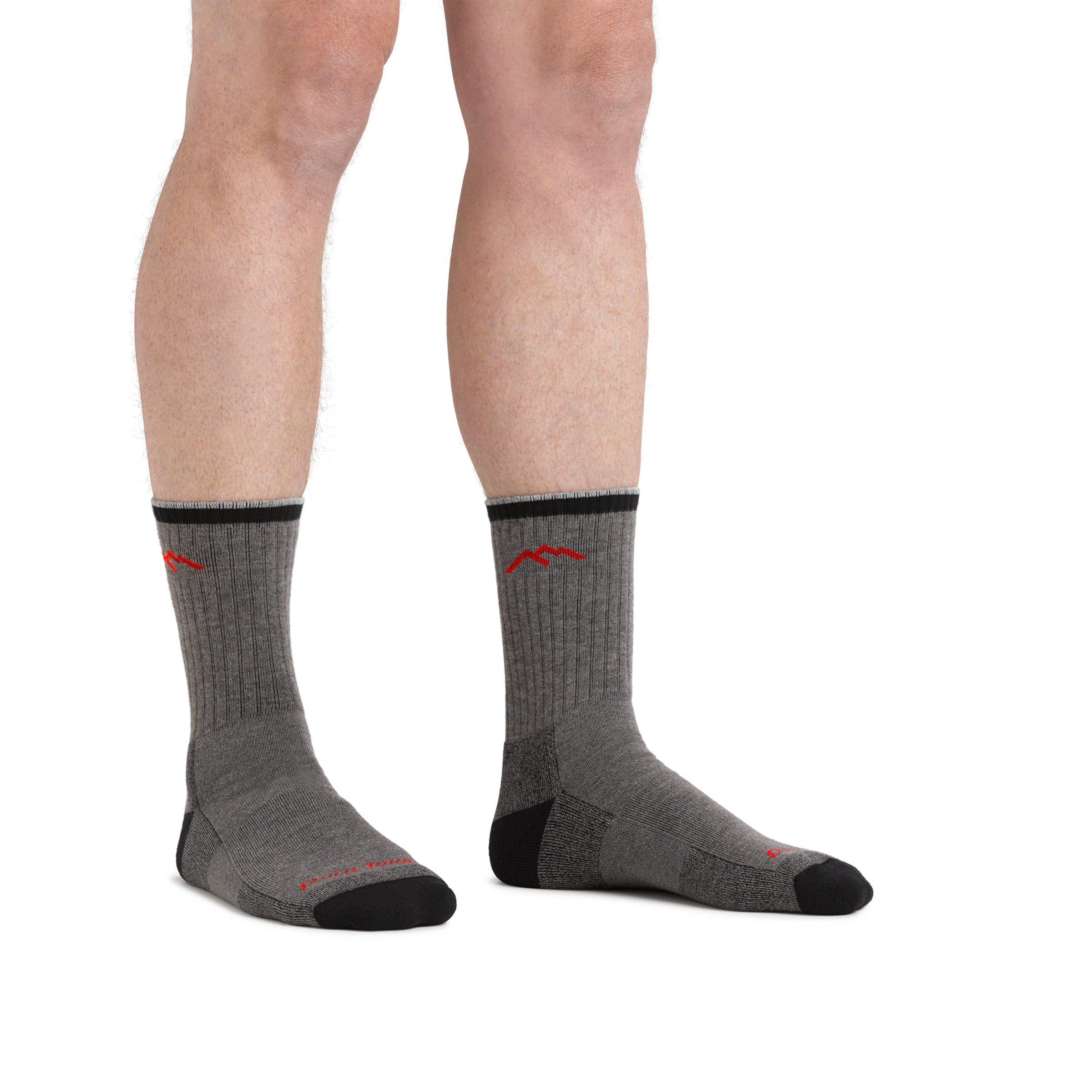 Man standing barefoot wearing Coolmax Hiker Micro Crew Hiking Socks in Gray/Black