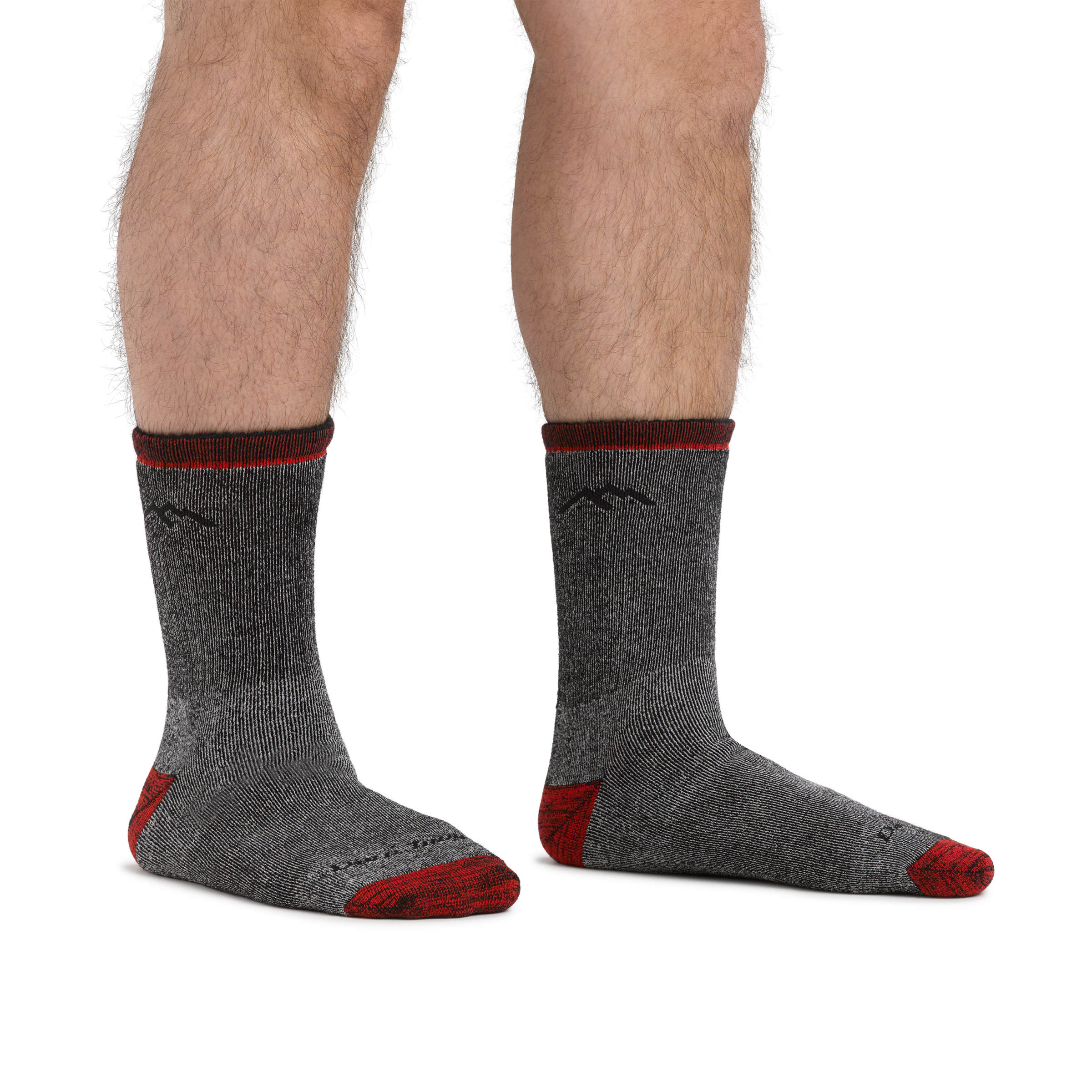 Man standing barefoot wearing Mountaineering Micro Crew Heavyweight Hiking Socks in Smoke