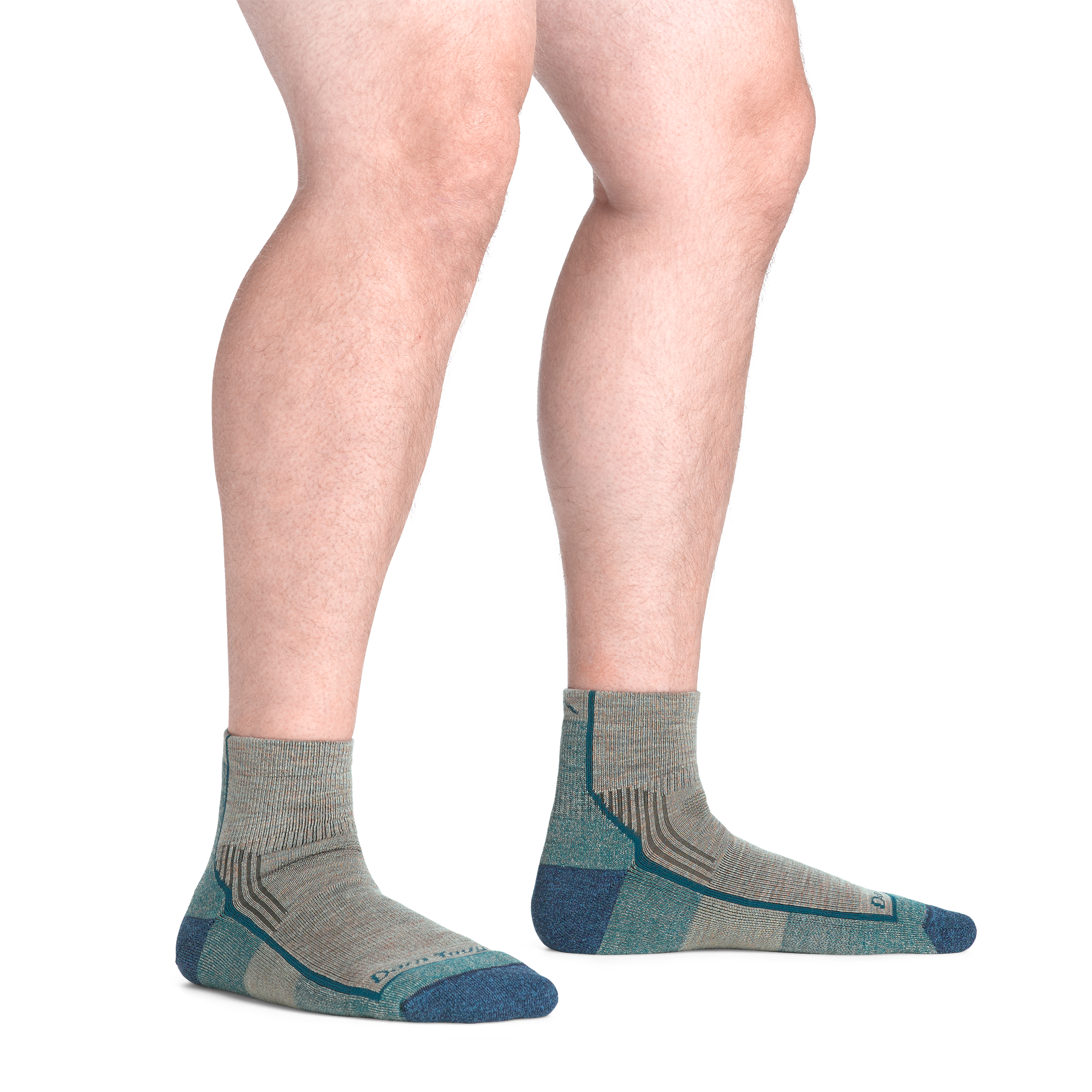 model standing barefoot wearing the 1959 quarter midweight hiking sock in rye colorway