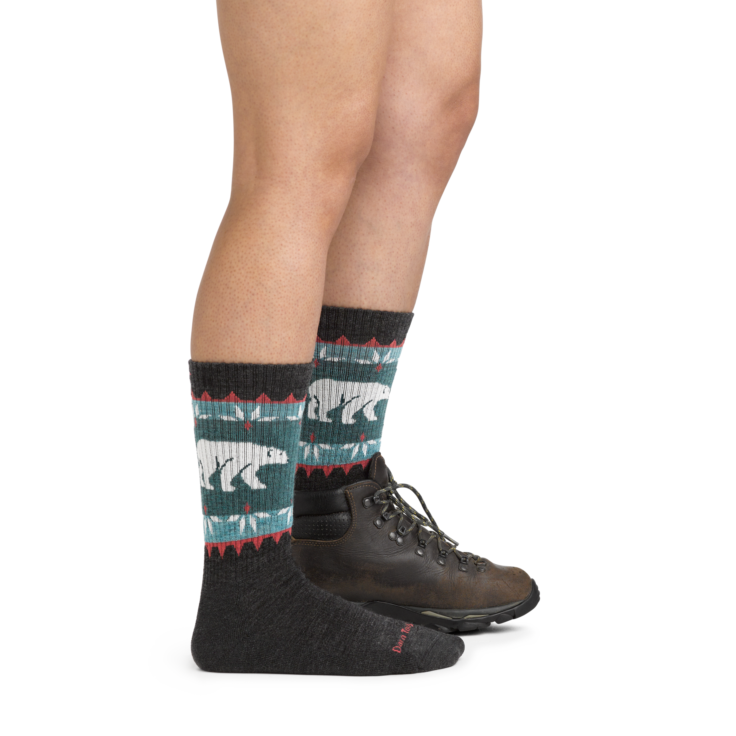 Image of model wearing 5017 Vanna Grizzle Hiking Socks in Charcoal colorway and dark brown hiking boot on one foot
