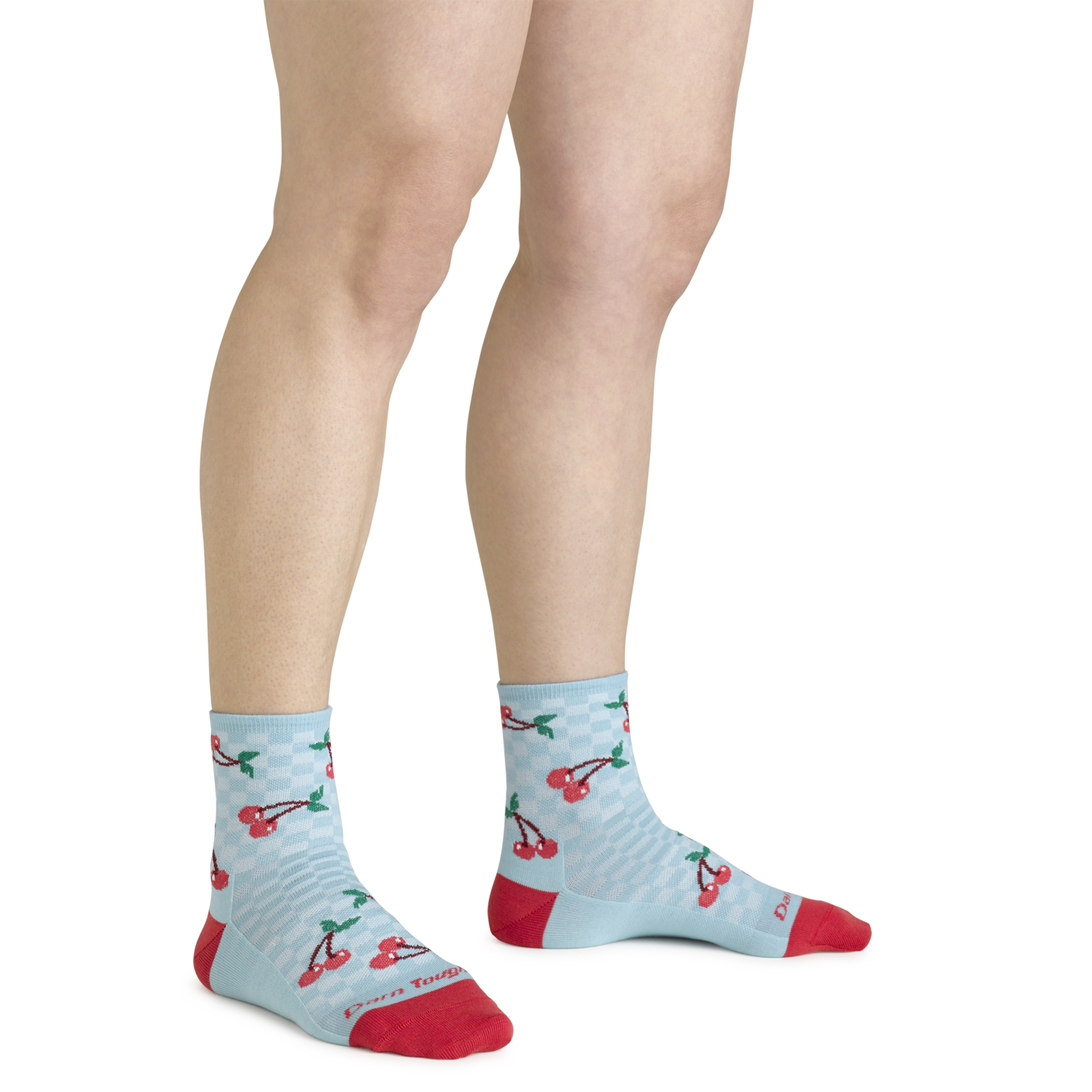 Close up shot of model wearing the women's fruit stand shorty lifestyle socks in glacier blue with no shoes on