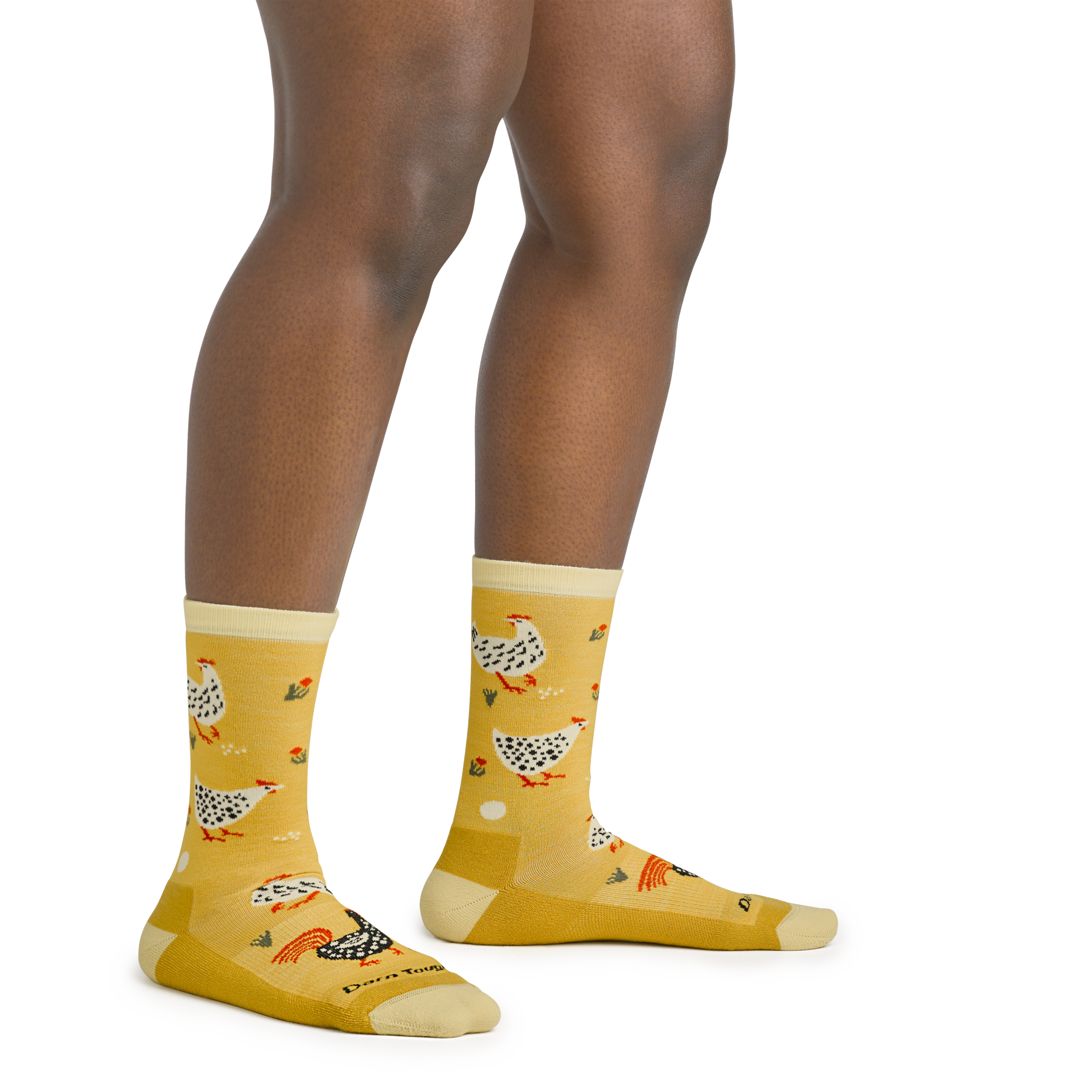 On model image of 6114 Mother Clucker Lifestyle socks in Sunny colorway featuring yellow body and white and black chickens