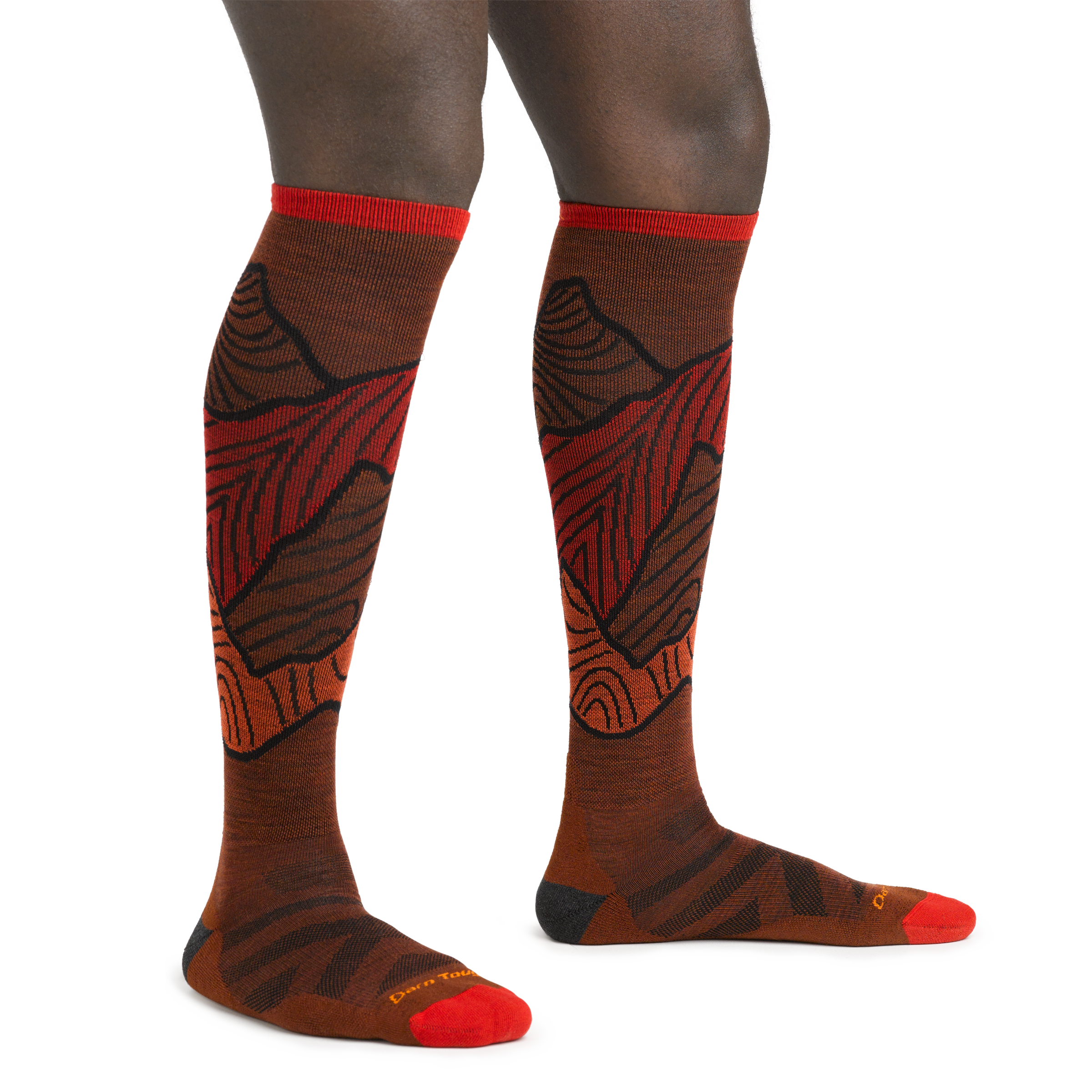 Three quarter on-model image of 5050 Titan Over the Calf Ski and Snowboard socks in Fireball colorway 