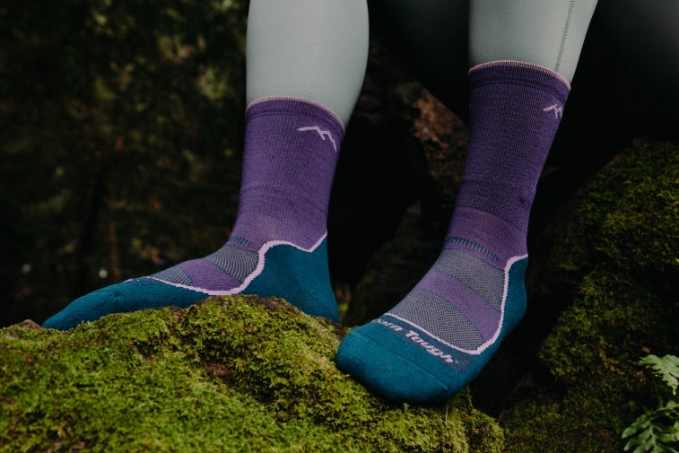 Shop Favorite Hiking Socks - feet wearing the Light Hiker sock in dark purple