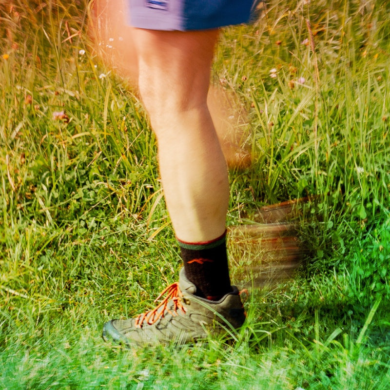 A hiker wearing the 1466 hiker micro crew socks, our best sellers